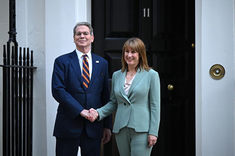 Rachel Reeves (R), greets Scott Bessent, outside 11, Downing Street on September 16, 2025 in London, England.