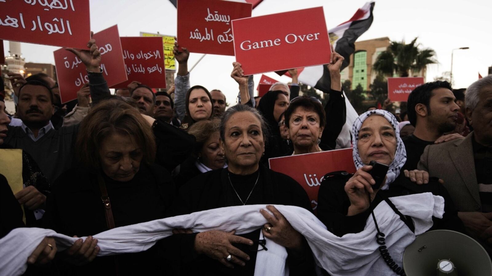 cheats/2012/12/06/morsi-solve-crisis-with-dialogue/morsi-egypt-cheat_yub8eo