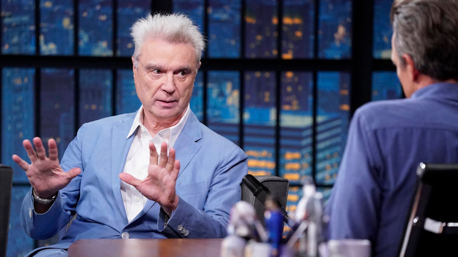 David Byrne talks with host Seth Meyers