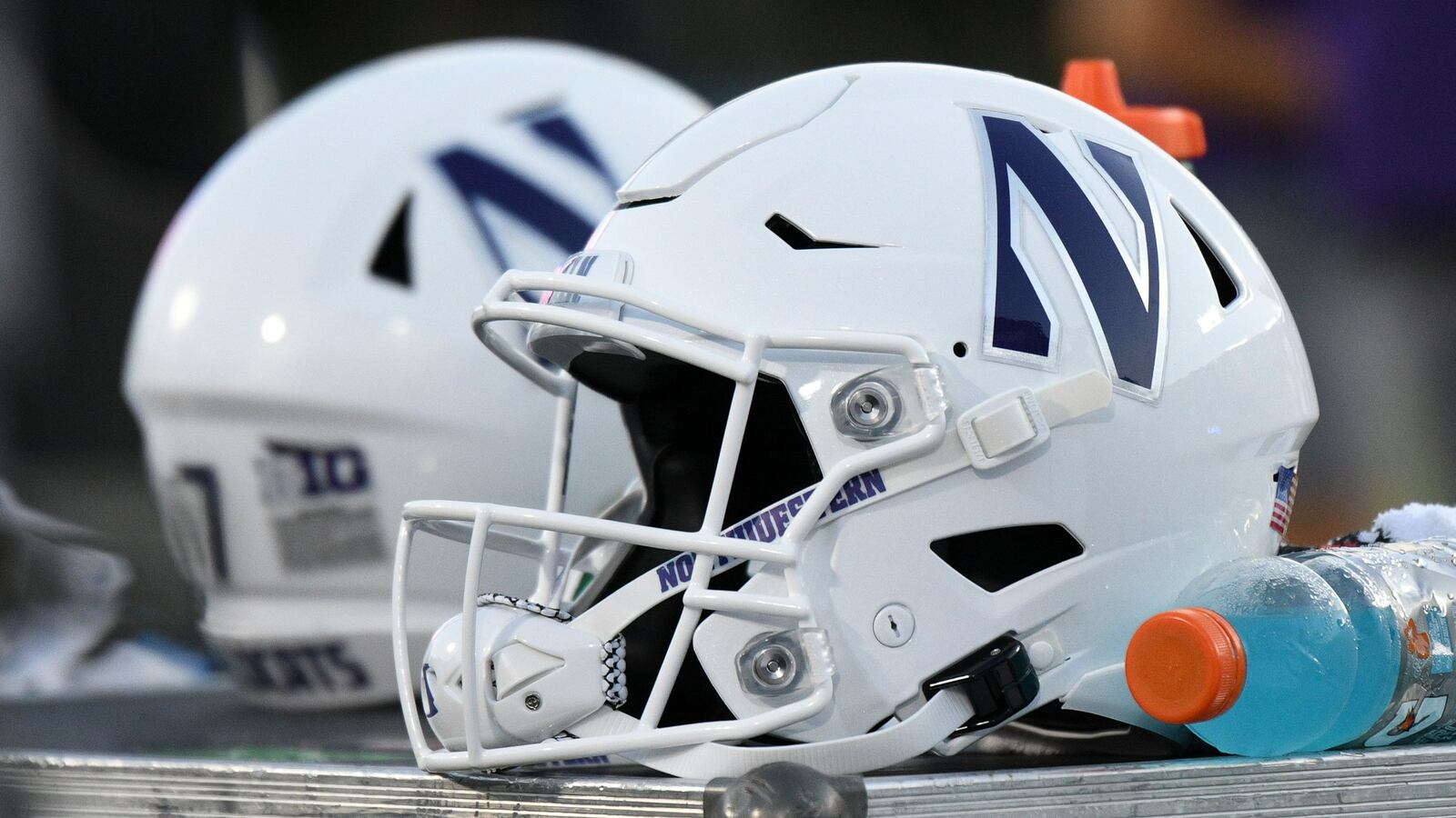 A Northwestern Wildcats helmet sits on an equipment chest during the fourth quarter at Wallace Wade Stadium.