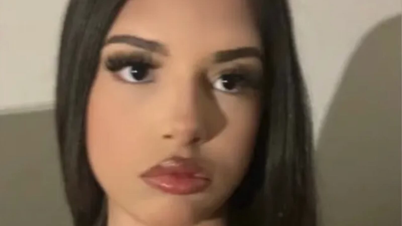 Mia Dieguez stares forward in a selfie.