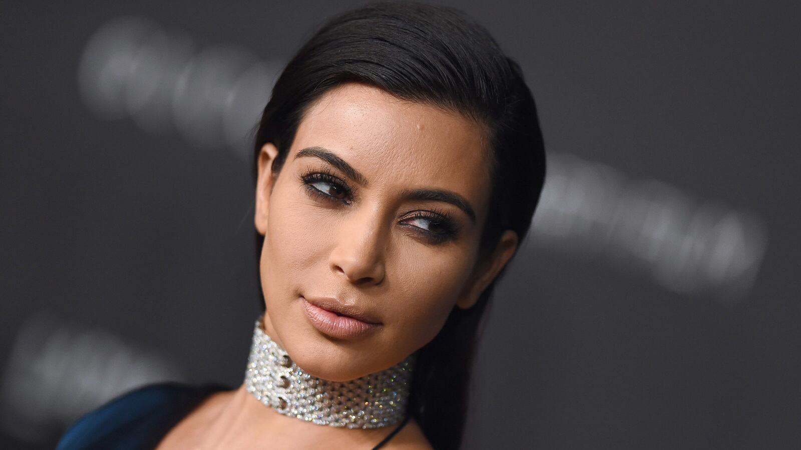 articles/2016/10/11/how-kim-kardashian-is-fighting-back-after-traumatic-paris-robbery/161011-zimmerman-kardashians-tease_upouzb