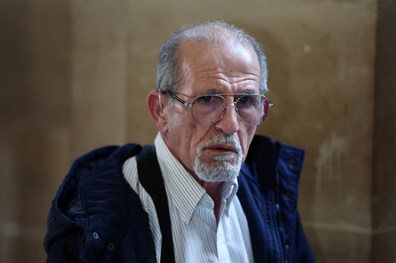 Aomar Ait Khedache leaves during a break on the first day of his trial with 9 other people accused of stealing millions of dollars worth of jewellery from Kim Kardashian, who was held at gunpoint in her apartment during Paris fashion week in 2016, a trial known as the "Rue Tronchet" affair, at the Court of Appeal of Paris, France, April 28, 2025.