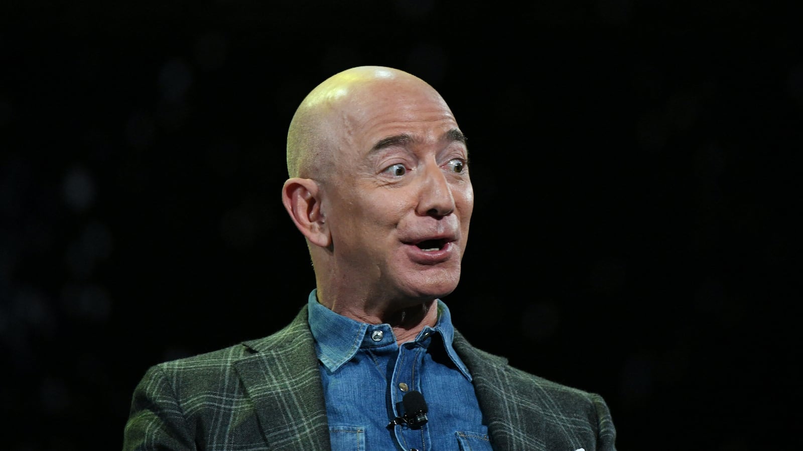 Jeff Bezos addresses the audience during a keynote session at the Amazon Re:MARS conference on robotics and artificial intelligence at the Aria Hotel in Las Vegas, Nevada on June 6, 2019.
