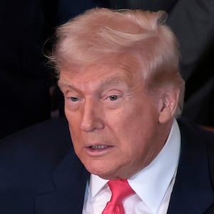 WASHINGTON, DC - NOVEMBER 13: U.S. President Donald Trump, joined by first lady Melania Trump, members of his administration and foster care advocates, speaks before signing the "Fostering the Future" executive order in the East Room of the White House on November 13, 2025 in Washington, DC. The executive order, championed by first lady Melania Trump, works to expand opportunities for education, career development, housing and other resources for youth transitioning from foster care to adulthood. (Photo by Heather Diehl/Getty Images)