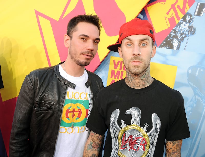 DJ AM and musician Travis Barker arrives at the 2008 MTV Video Music Awards  at Paramount Pictures Studios on September 7, 2008 in Los Angeles, California.