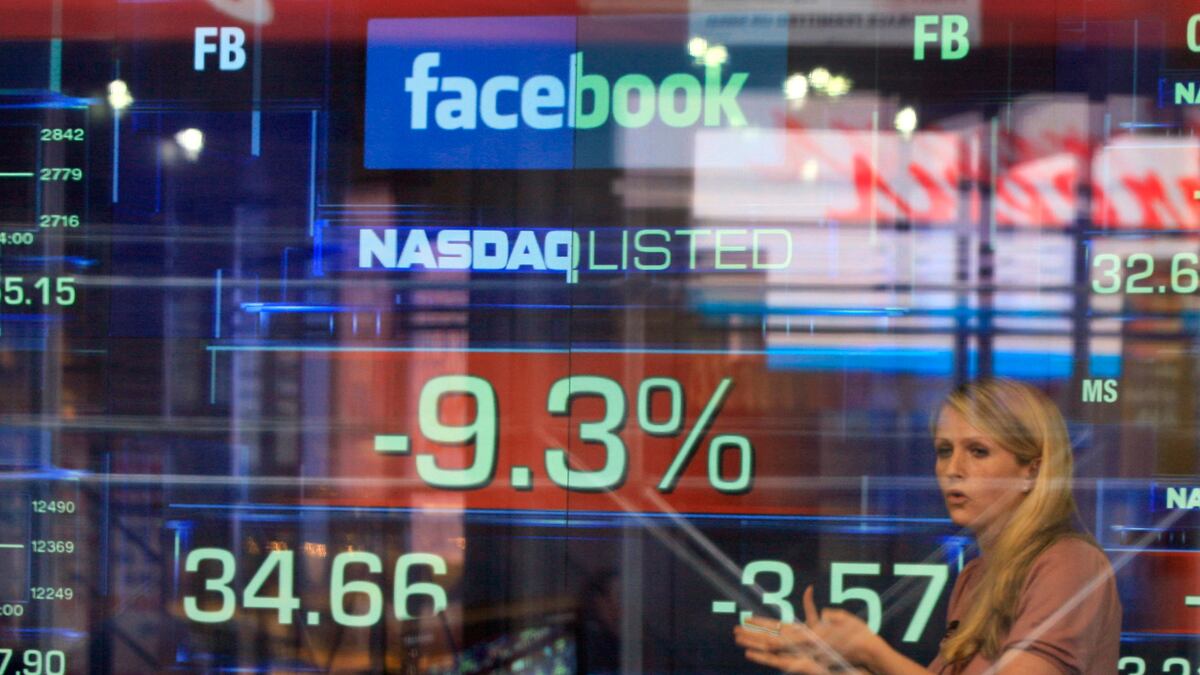 articles/2012/05/22/zuckerberg-bombshell-did-facebook-bankers-secretly-slash-forecasts-before-ipo/lyons-facebook-scandal-topbox_ijjx25