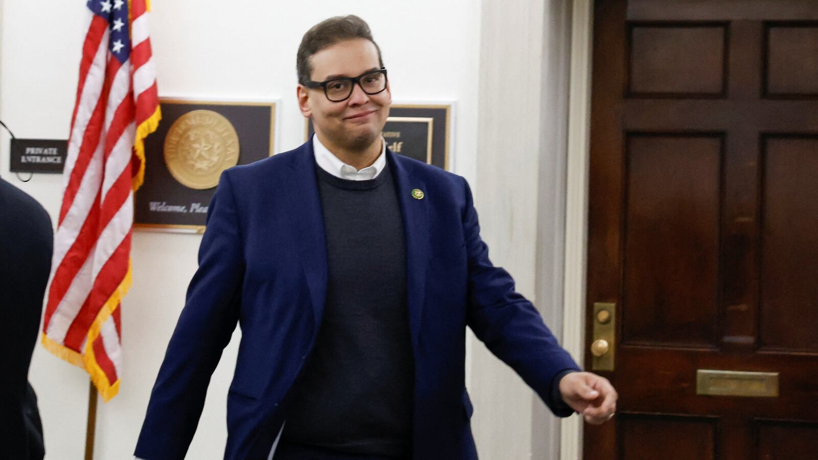Rep. George Santos (R-NY) returns to his office after telling a Republican party conference that he will recuse himself from House committee assignments on Capitol Hill in Washington, DC.