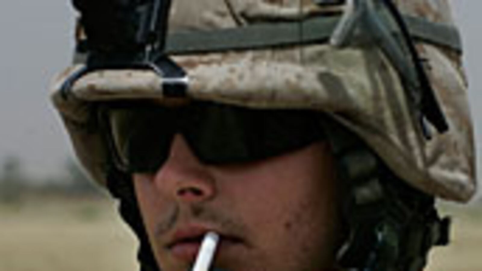 articles/2009/02/03/for-soldiers-like-me-cigarettes-and-war-are-inseparable/buzell-smoking_12700_eult9a