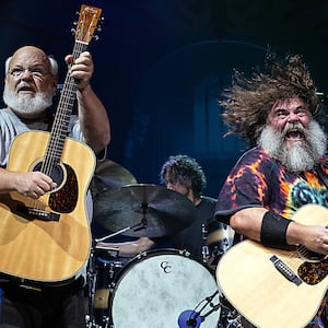 Kyle Gass, Jack Black, and bassist John Spiker of Tenacious D perform at PNC Music Pavilion on Sept. 6, 2023, in Charlotte, North Carolina.