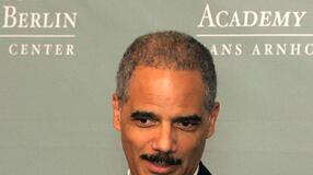 cheats/2009/10/30/obama-administration-to-block-wiretap-suit/eric-holder-in-germany_n4tzuk