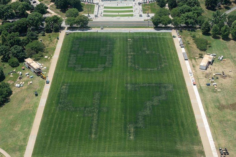 The remnants of markings depicting the numbers 8647 near the Lincoln Memorial Reflecting Pool after recent renovations following a directive from U.S. President Donald Trump to paint it blue ahead of the 250th anniversary of U.S. independence, in Washington, D.C., U.S., June 19, 2026.