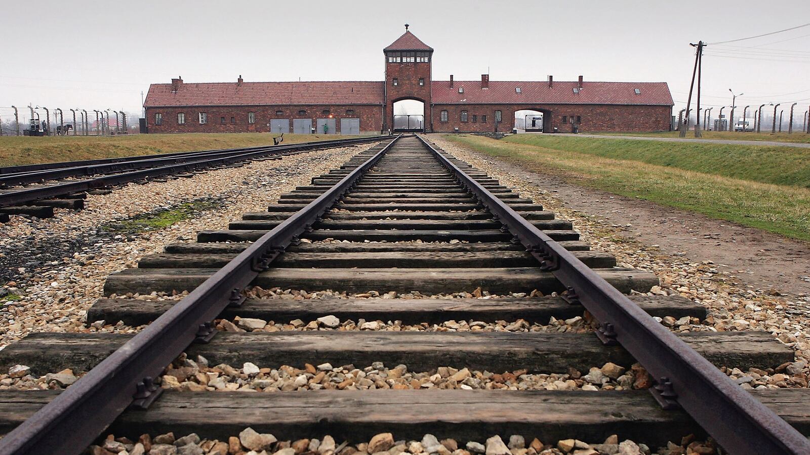 cheats/2014/07/03/german-teacher-arrested-at-auschwitz/140703-auschwitz-tease_e3mha3