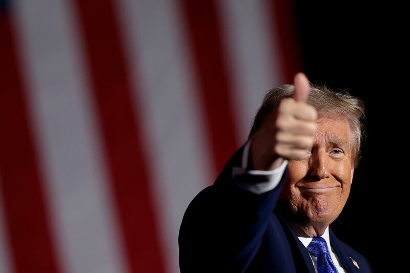 Republican presidential nominee Donald Trump gestures after speaking at a campaign rally on October 19, 2024, in Latrobe, Pennsylvania.