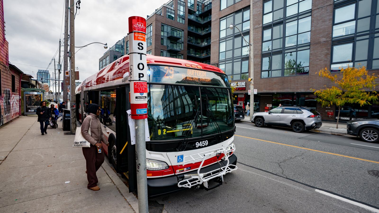 People board a TTC bus in Toronto, Canada, on October 27 2025.
