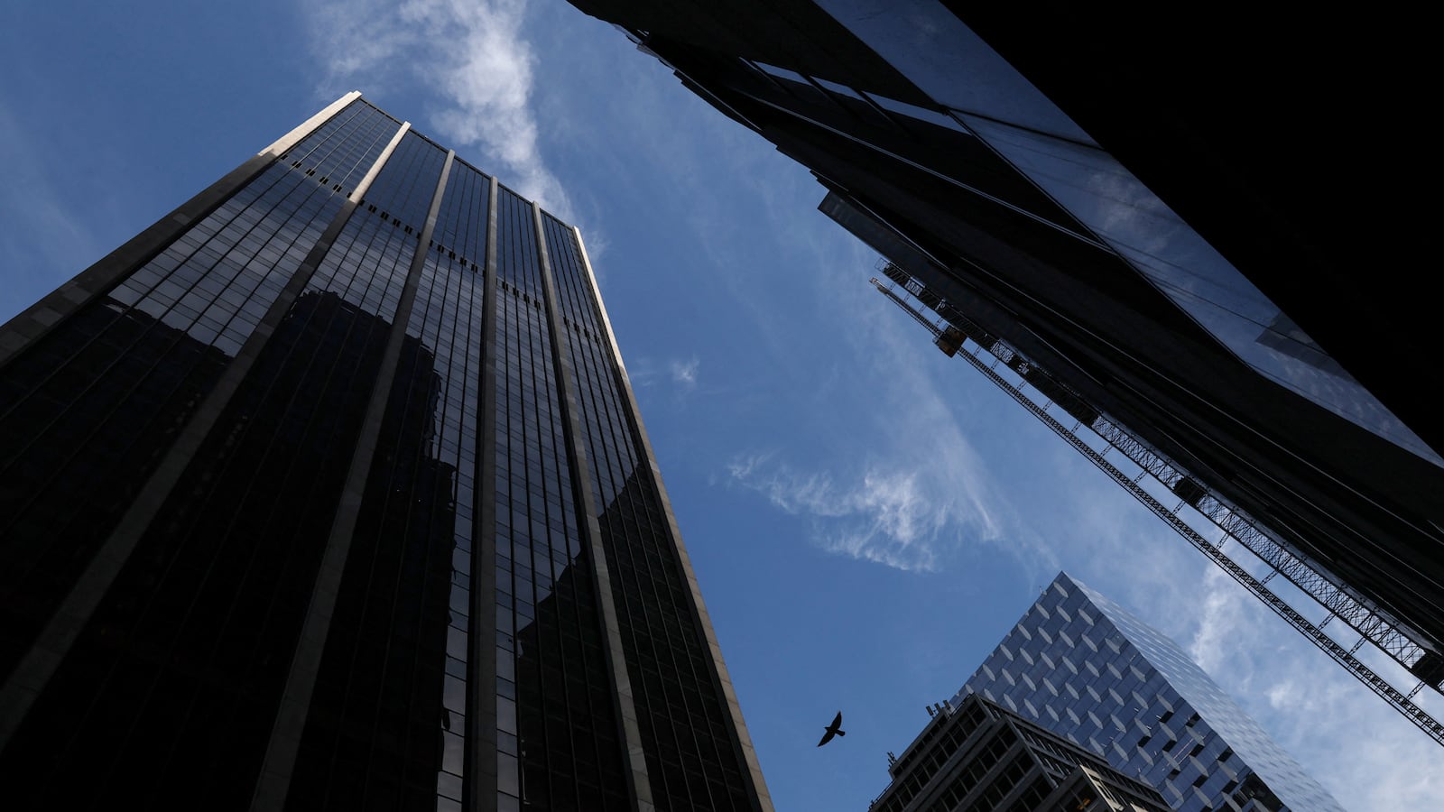 A view from under New York City skyscrapers.