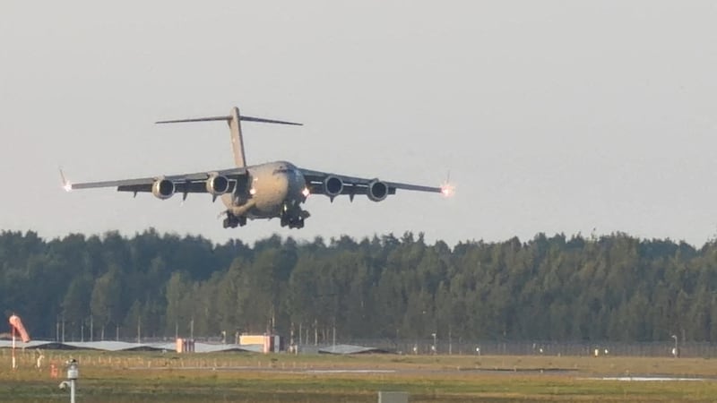 A C-17 Globemaster, believed to be carrying U.S. CIA Director John Ratcliffe, lands near Riga, Latvia, August 25, 2026, in this frame obtained from a social media video.
