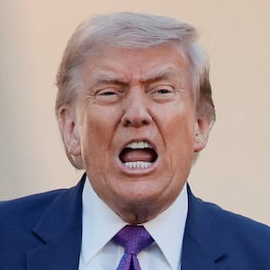 U.S. President Donald Trump reacts after delivering remarks during his second 'Rose Garden Club' dinner in honour of Police Week at the White House in Washington, D.C., U.S., May 11, 2026.