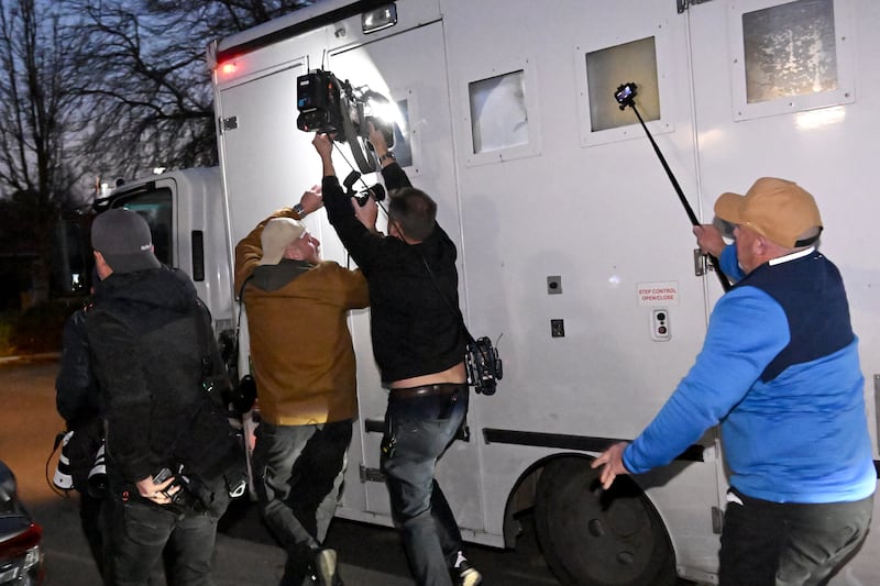 Members of the media follow a police vehicle transporting Erin Patterson as it leaves the Latrobe Valley Magistrates' Court in Morwell on July 7, 2025. An Australian woman murdered her husband's parents and aunt by lacing their beef Wellington lunch with toxic mushrooms, a jury found on July 7 at the climax of a trial watched around the world. Keen home cook Erin Patterson hosted an intimate meal in July 2023 that started with good-natured banter and earnest prayer -- but ended with three guests dead. (Photo by WILLIAM WEST / AFP) (Photo by WILLIAM WEST/AFP via Getty Images)