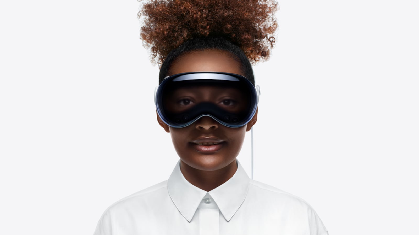 Apple Vision Pro headset on a woman.