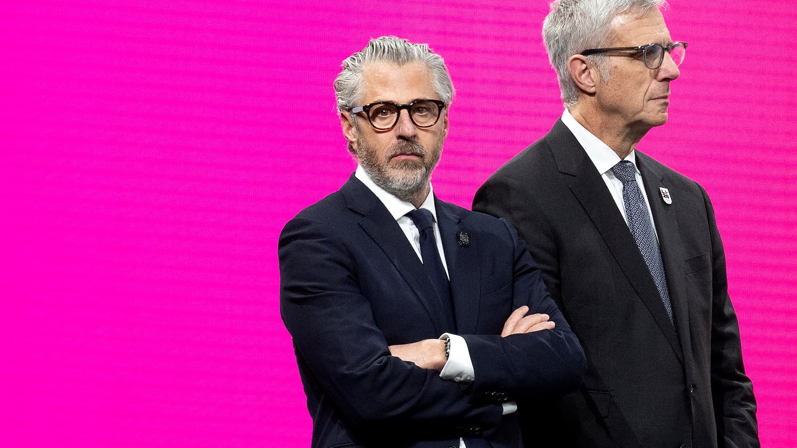 MILAN, ITALY - FEBRUARY 03: Chairman of LA28 Casey Wasserman (L) and CEO of LA28 Reynold Hoover look on during the IOC Session at the Main Media Centre MPC at Allianz MiCo on February 03, 2026 in Milan, Italy. (Photo by Andreas Rentz/Getty Images)