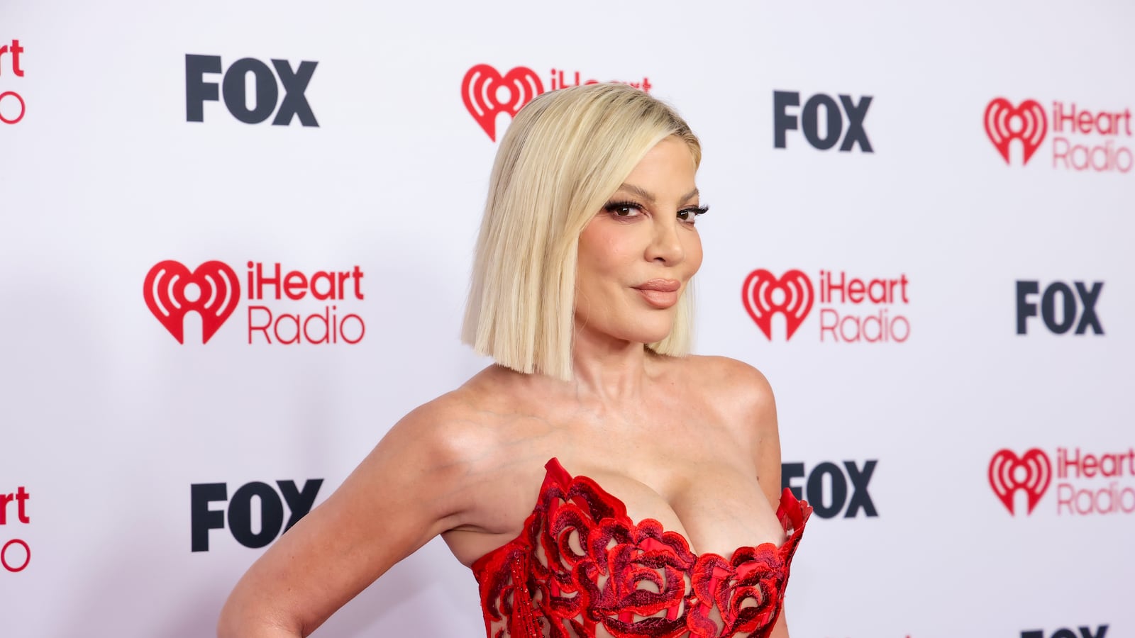 HOLLYWOOD, CALIFORNIA - MARCH 26: Tori Spelling attends the 2026 iHeartRadio Music Awards at Dolby Theatre on March 26, 2026 in Hollywood, California.