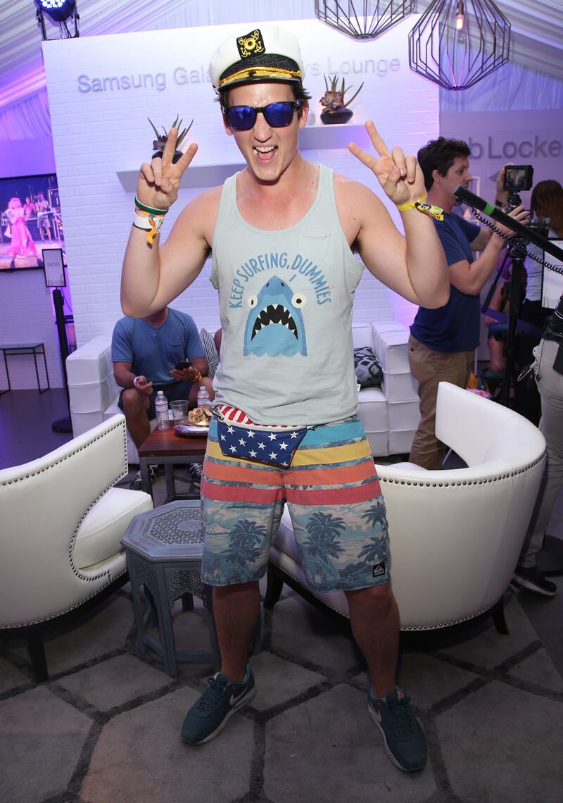 galleries/2014/04/14/jourdan-dunn-rita-ora-and-more-celebrities-at-coachella-2014-photos/2014-coachella-fashion-teller_swx9fa