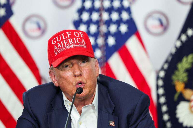 President Donald Trump speaks as he visits a temporary migrant detention center informally known as "Alligator Alcatraz" in Ochopee, Florida