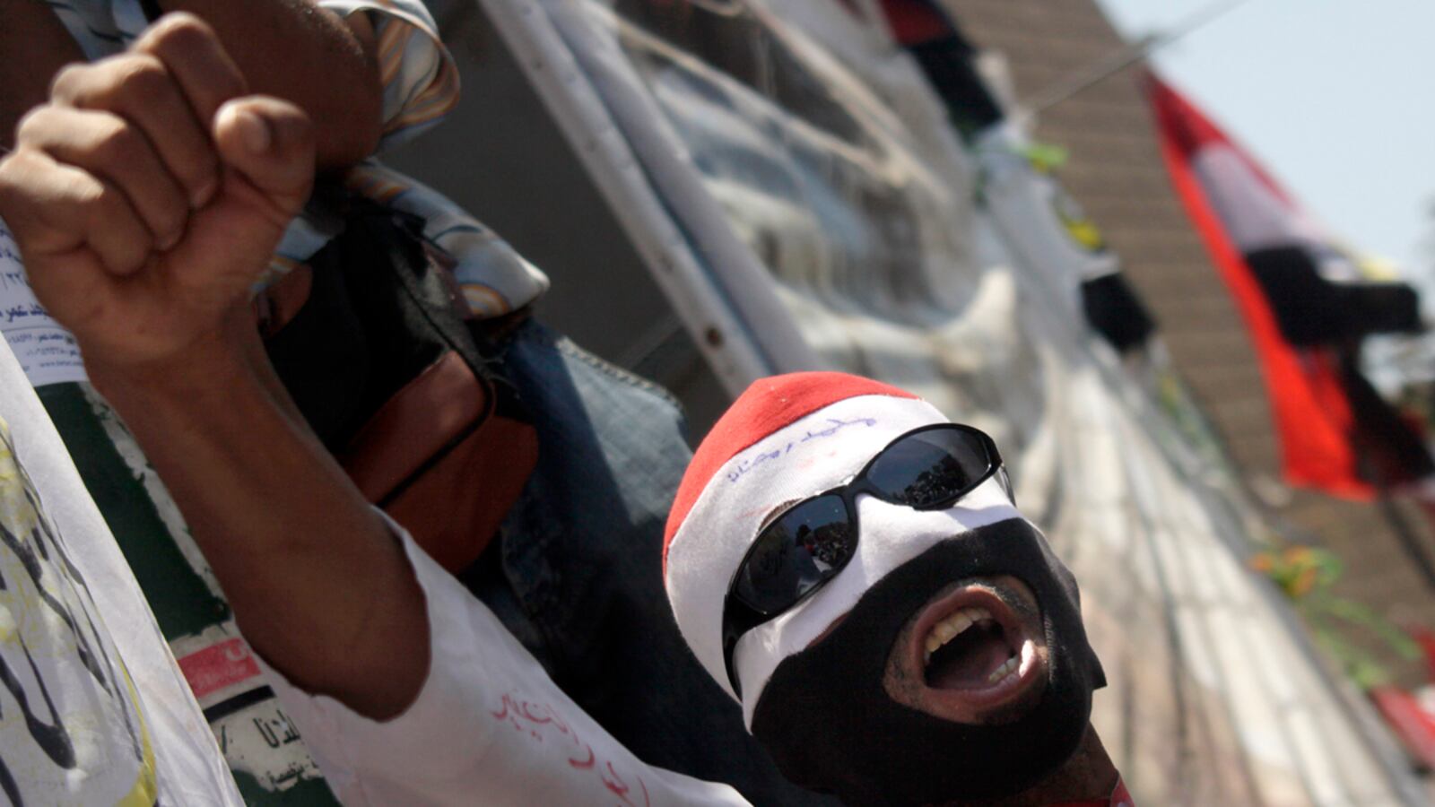 cheats/2011/07/23/protesters-attacked-with-knives/egypt-tahrir-protest_wwtkwk