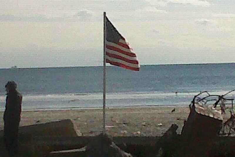 articles/2012/11/06/heroism-in-the-rockaways-after-hurricane-sandy/rockaway-flag-daly_uv6ywa