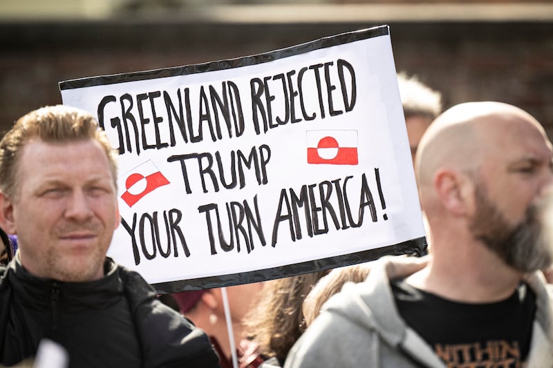People protest against the American pressure taking place against Greenland and Denmark, in front of the American Embassy in Copenhagen on March 29, 2025. Denmark said on March 29, 2025 it did not like the "tone" of US Vice-president JD Vance after he accused Copenhagen of under-investing in Greenland during a visit to the Danish territory.