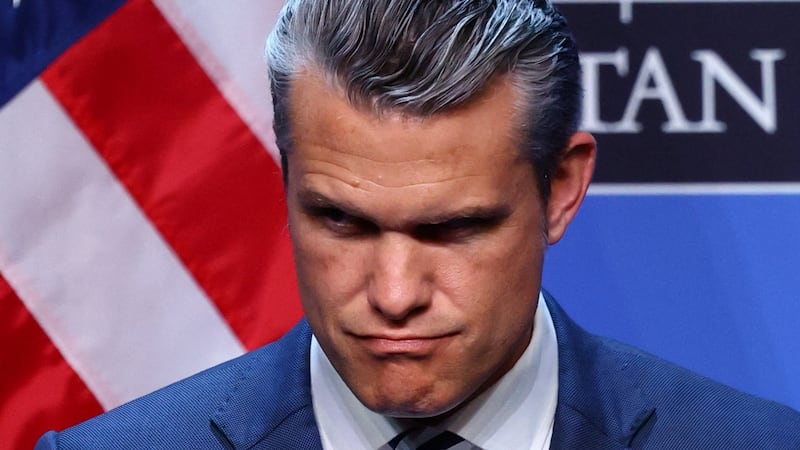 U.S. Defense Secretary Pete Hegseth looks on as U.S. President Donald Trump speaks to the media at the end of his participation in the NATO leaders summit in Ankara, Turkey, July 8, 2026.