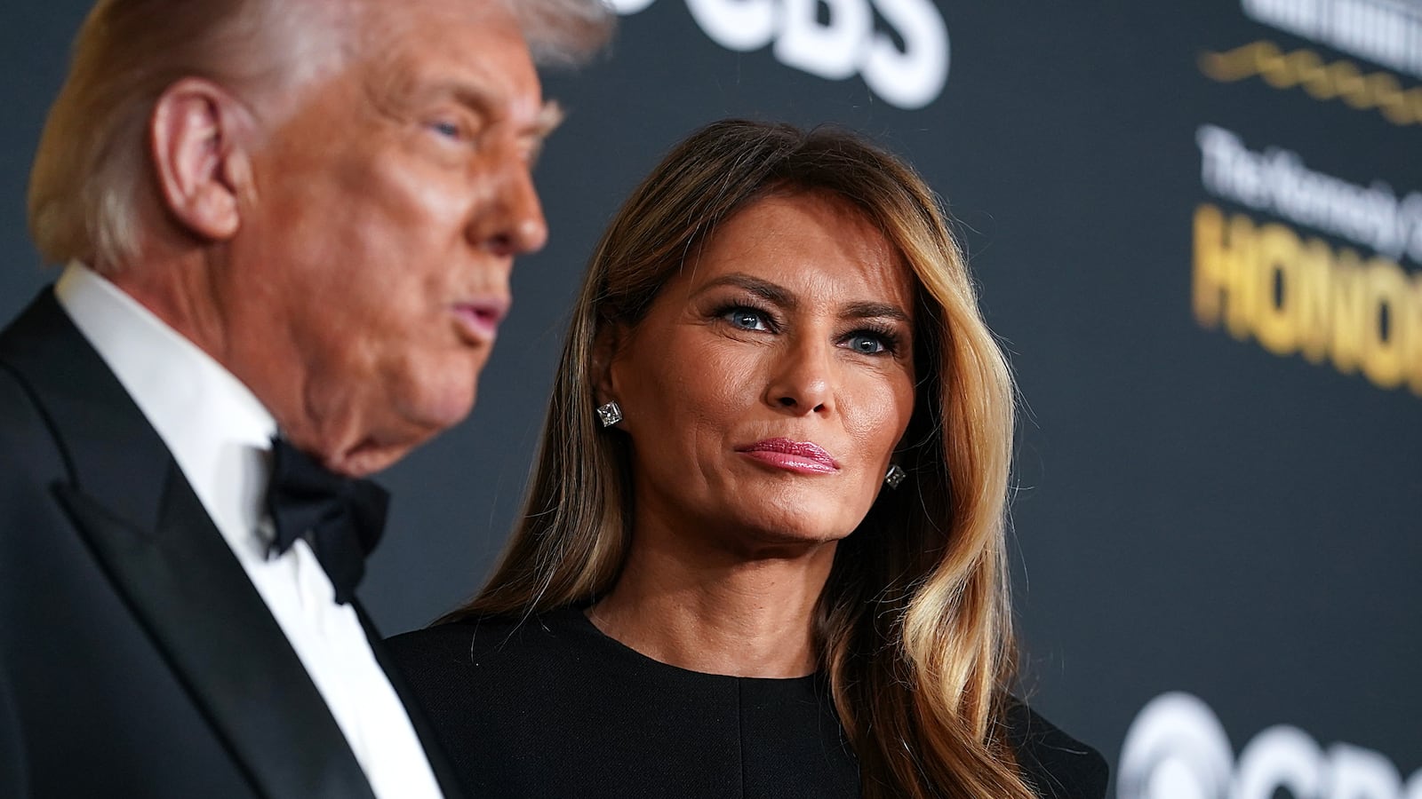WASHINGTON, DC - DECEMBER 07: First lady Melania Trump and U.S. President Donald Trump attend the 48th annual Kennedy Center Honors at the Kennedy Center on December 07, 2025 in Washington, DC. The 2025 Kennedy Center Honorees are Sylvester Stallone, George Strait, the rock band KISS, Gloria Gaynor, and Michael Crawford.