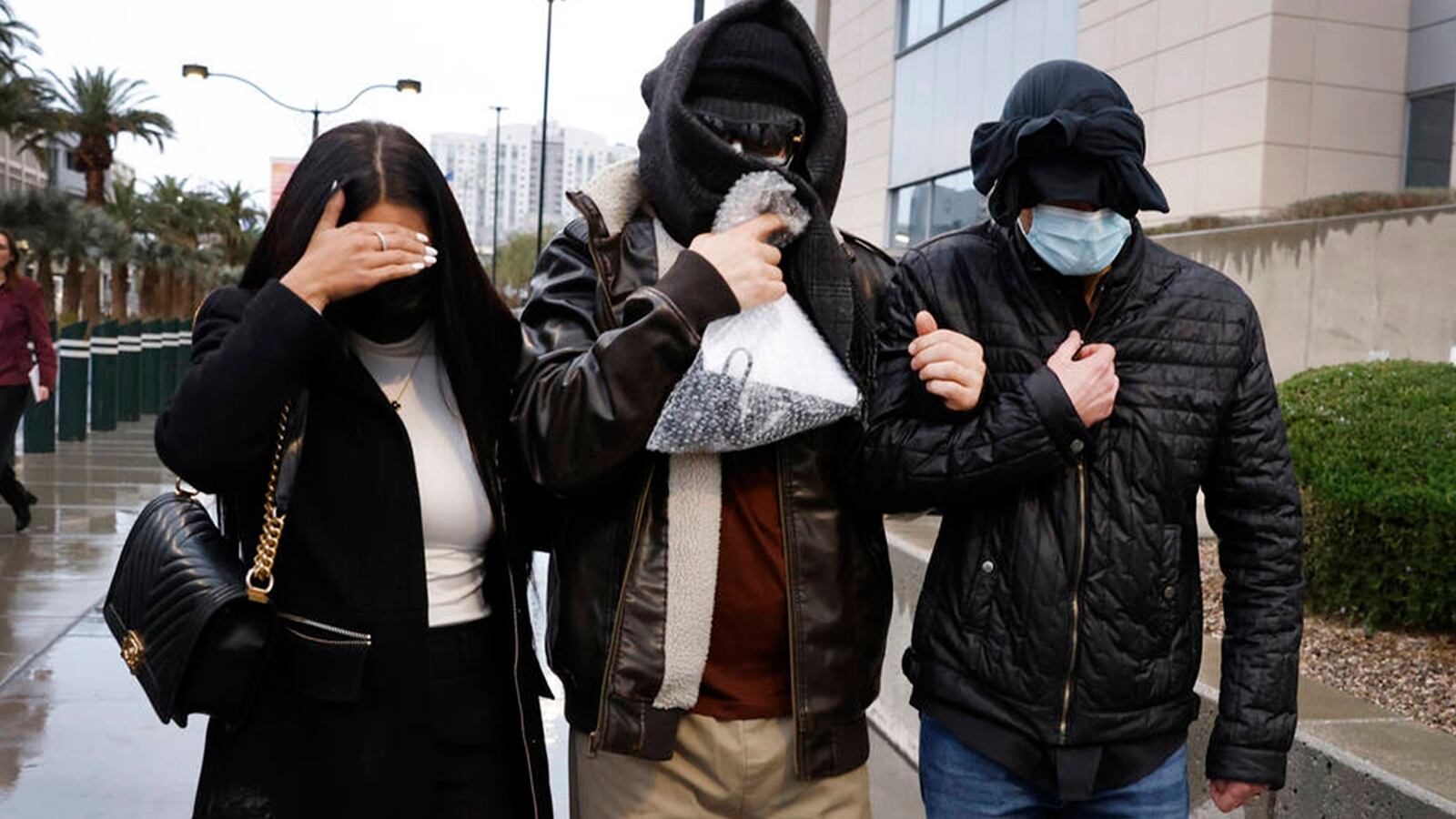 Alexander Smirnov, center, a confidential human source with the FBI, leaves the Lloyed George U.S. Courthouse, on Tuesday, Feb. 20, 2024, in Las Vegas. Smirnov is accused of falsely stating that executives with the Ukrainian energy company Burisma paid Hunter and Joe Biden $5 million each in 2015 or 2016. (Bizuayehu Tesfaye/Las Vegas Review-Journal/Tribune News Service via Getty Images)