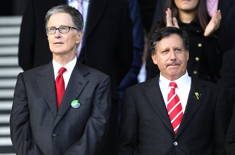 Liverpool FC's new owners John W Henry (left) and Thomas (Tom) Werner (right) of NESV in the stands prior to kick-off (Photo by Mike Egerton - PA Images via Getty Images)