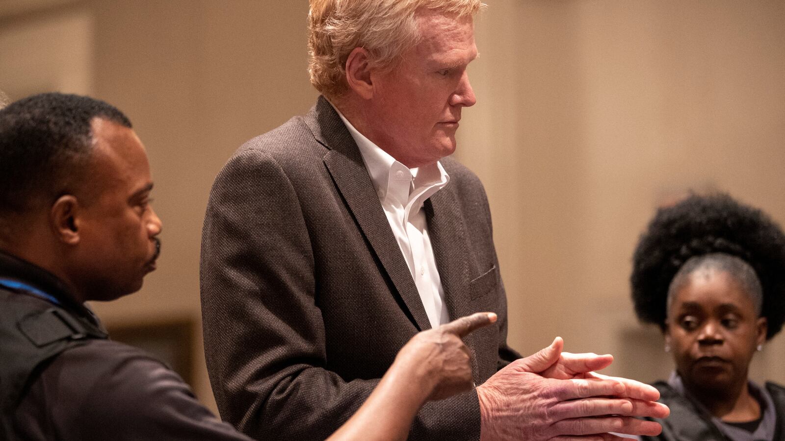 Alex Murdaugh stands after he was found guilty on all four counts.