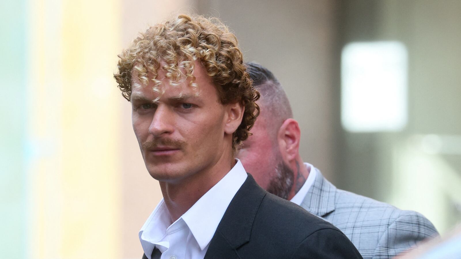 Former U.S. Marine Daniel Penny is taken from a New York City Police precinct under arrest for the death of Jordan Neely n New York City, U.S., May 12, 2023.