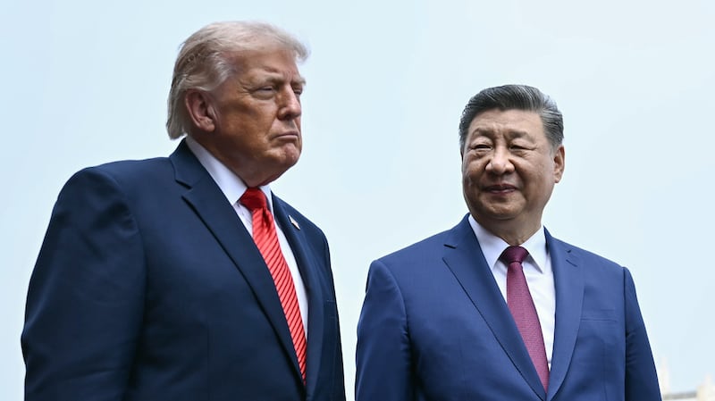 BEIJING, CHINA - MAY 14: China's President Xi Jinping (R) and US President Donald Trump visit the Temple of Heaven on May 14, 2026 in Beijing, China. Xi warned Trump that the issue of Taiwan could push their two countries into "conflict" if mishandled, a stark opening salvo as a superpower summit set to tackle numerous thorny issues began in Beijing on May 14. (Photo by Brendan Smialowski - Pool/Getty Images)
