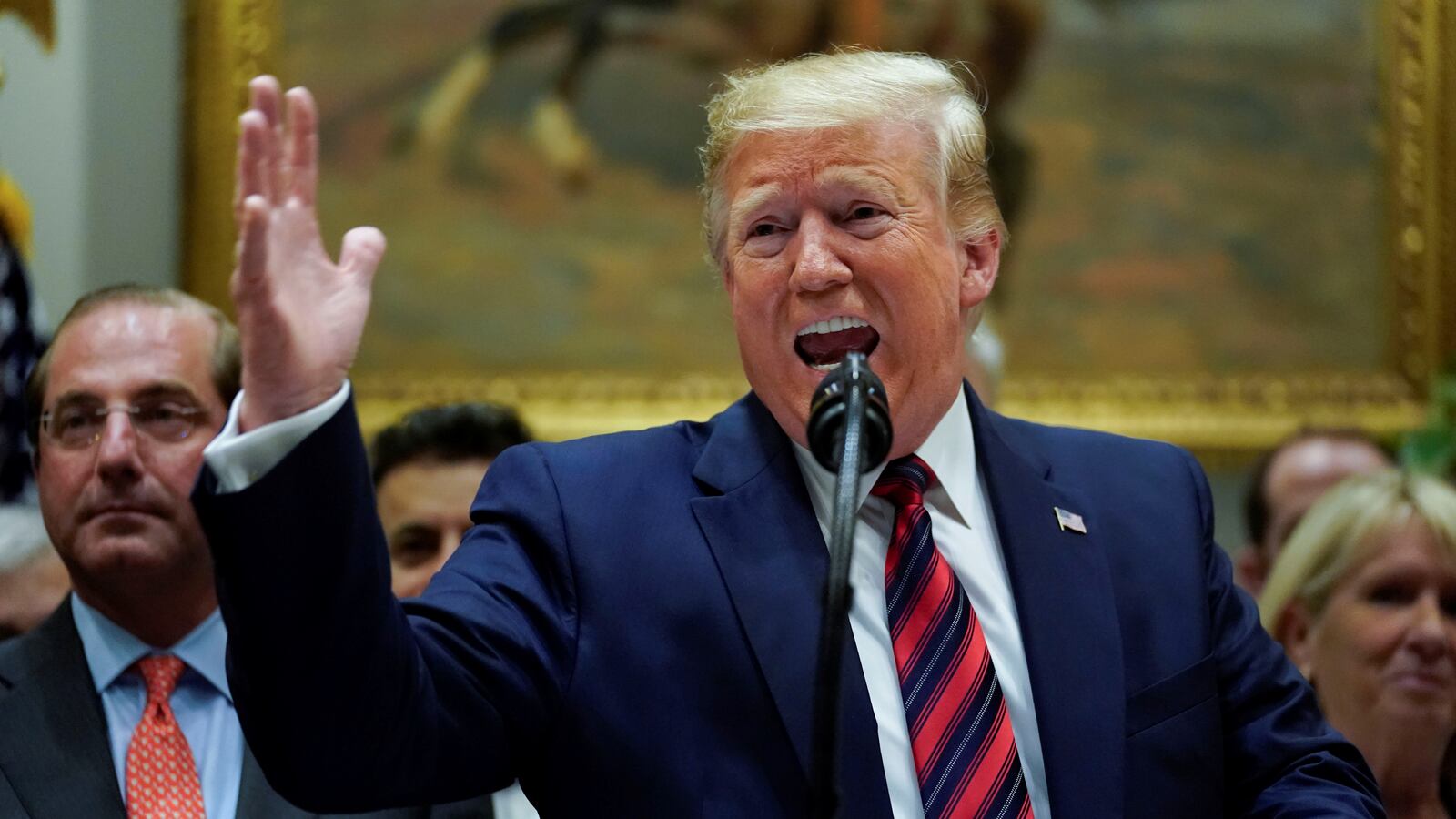 President Donald Trump responds to questions from reporters after an event centered on a proposal to end surprise medical billing in the Roosevelt Room
