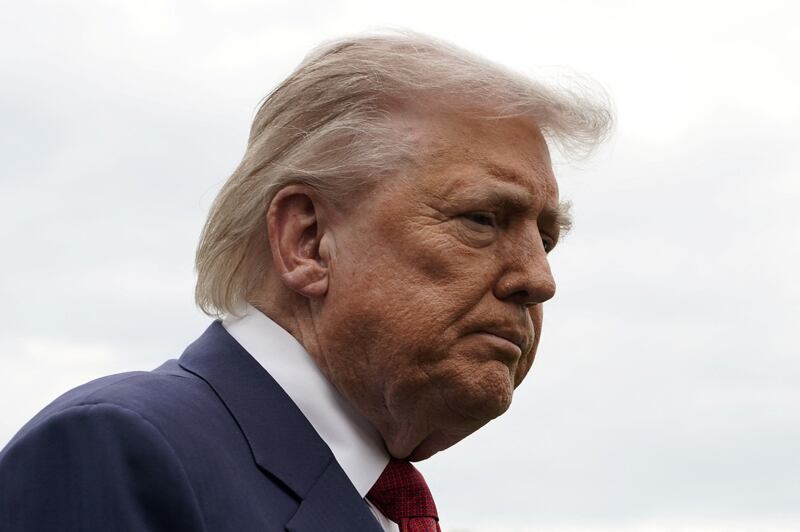 U.S. President Donald Trump looks on at the White House in Washington, D.C., U.S., May 8, 2026.