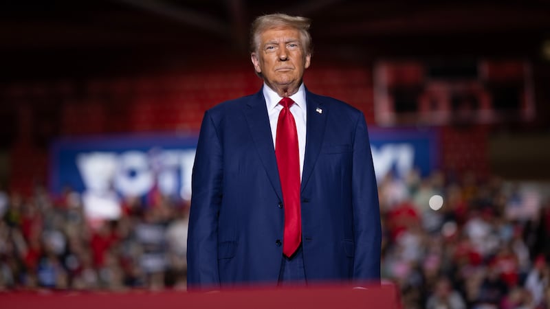 Republican presidential nominee former US President Donald Trump speaks to supporters during a campaign event at Saginaw Valley State University on October 03, 2024 in Saginaw, Michigan.