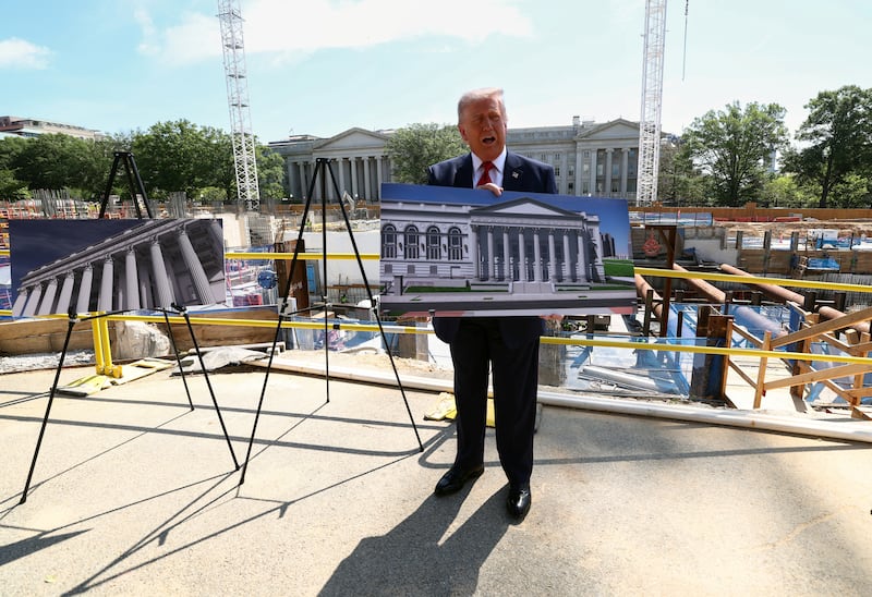 President Donald Trump said he was using this placard to hide his torso before laughing that the press saw enough of it during his trip to China.