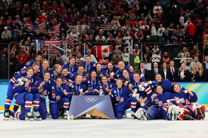 MILAN, ITALY - FEBRUARY 19: Gold medalist Team United States pose after the medal ceremony for the Ice Hockey Women following the Women's Gold Medal match between the United States and Canada on day 13 of the Milano Cortina 2026 Winter Olympic games at Milano Santagiulia Ice Hockey Arena on February 19, 2026 in Milan, Italy. (Photo by Bruce Bennett/Getty Images)