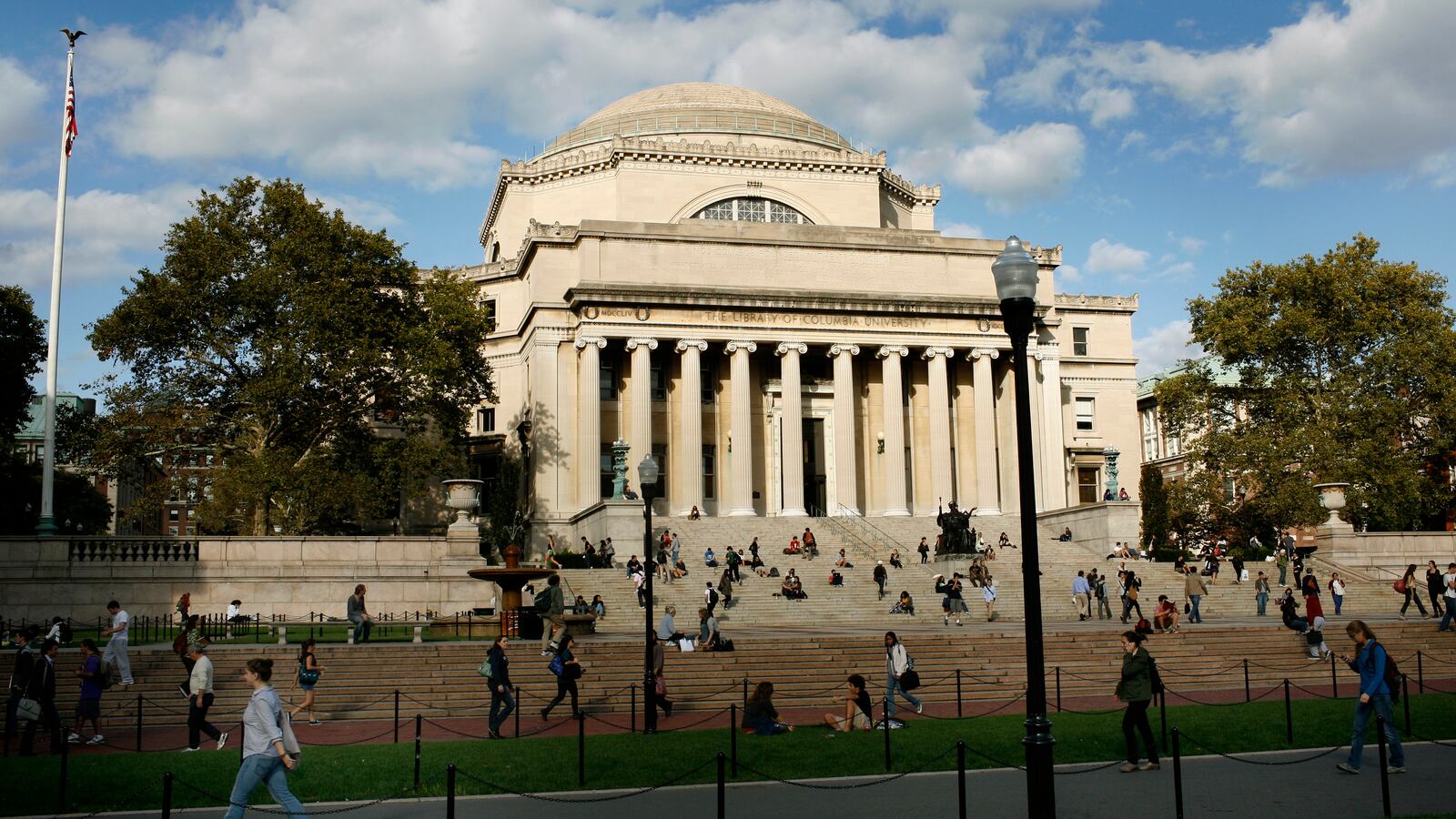 Students walk across the campus of Columbia University in New York, Oct. 5, 2009.