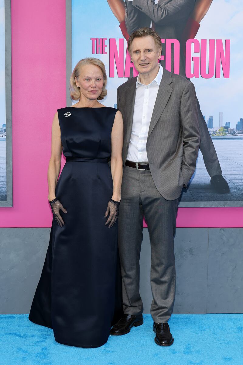 NEW YORK, NEW YORK - JULY 28: (L-R) Pamela Anderson and Liam Neeson attend "The Naked Gun" New York premiere on July 28, 2025 in New York City. (Photo by Dia Dipasupil/Getty Images)