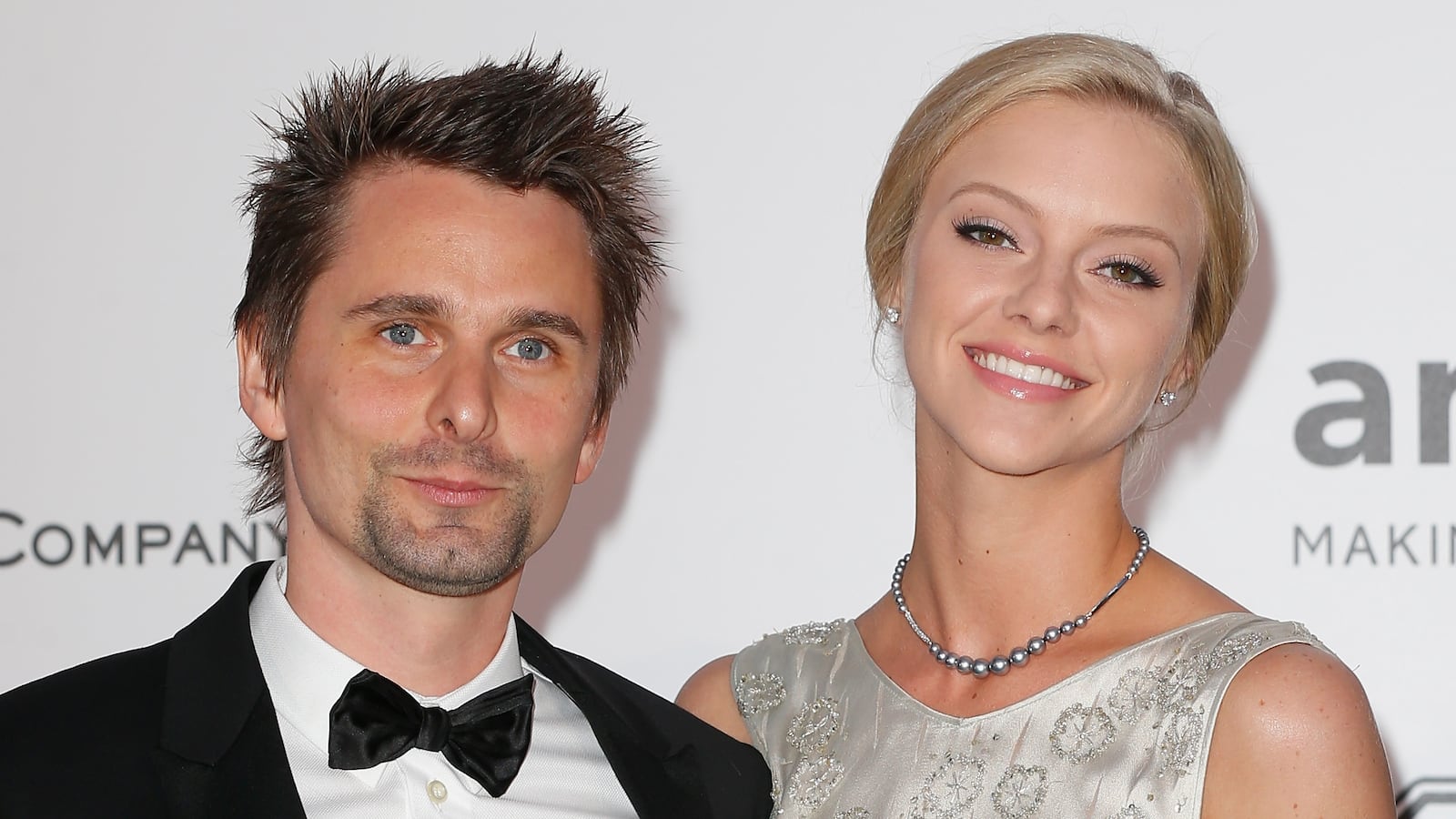 CAP D'ANTIBES, FRANCE - MAY 21: Singer Matt Bellamy (L) and Elle Evans attend amfAR's 22nd Cinema Against AIDS Gala, Presented By Bold Films And Harry Winston at Hotel du Cap-Eden-Roc on May 21, 2015 in Cap d'Antibes, France. (Photo by Tristan Fewings/Getty Images)
