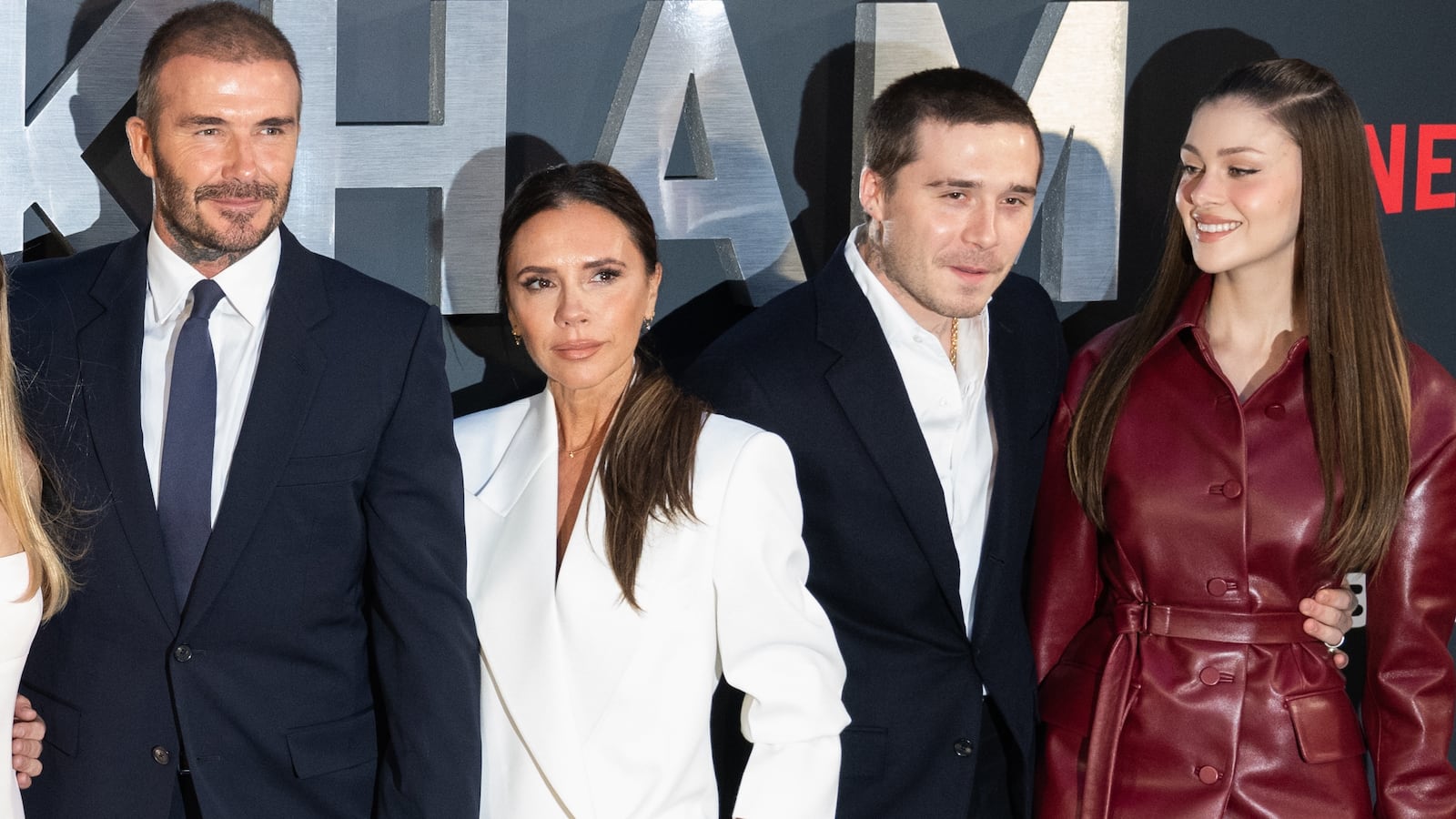 LONDON, ENGLAND - OCTOBER 03: (L-R)Harper Beckham, David Beckham, Victoria Beckham, Brooklyn Beckham and Nicola Peltz attend the Netflix 'Beckham' UK Premiere at The Curzon Mayfair on October 03, 2023 in London, England. (Photo by Samir Hussein/WireImage)