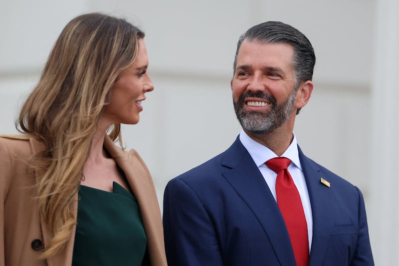 Donald Trump Jr. talks with his partner Bettina Anderson, after U.S. President Donald Trump's arrival to meet Irish President Catherine Connolly at Aras an Uachtarain, in Dublin, Ireland, September 12, 2026.