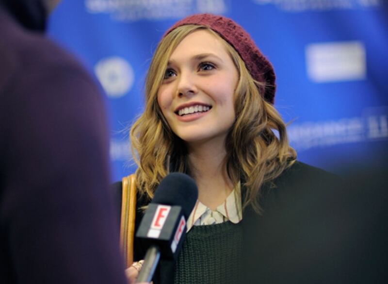 articles/2011/01/22/what-s-buzzing-at-sundance/lizzie-olsen-sundance-smile_volwoh