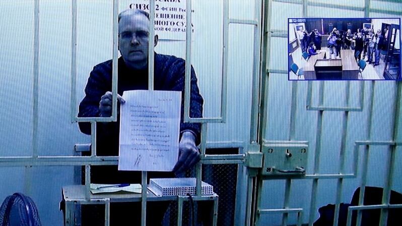Former U.S. marine officer Paul Whelan, who is charged with espionage against Russia, attends a court hearing via a video link in Moscow.